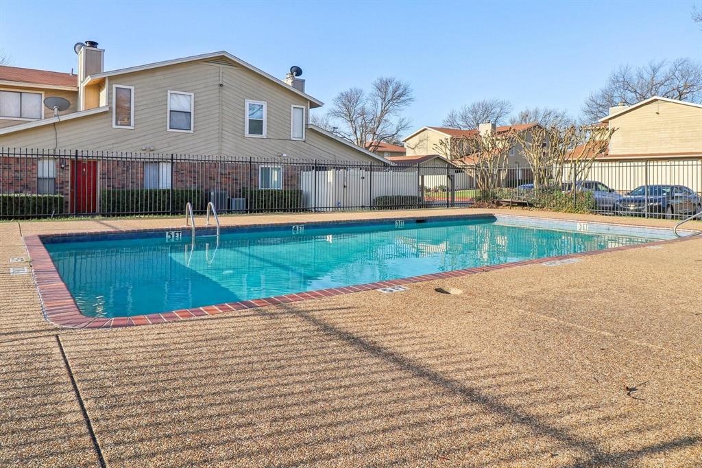2240 Tarpley Road, Unit 464 Carrollton, TX 75006 - Photo 18 of 18 a view of a house with a yard