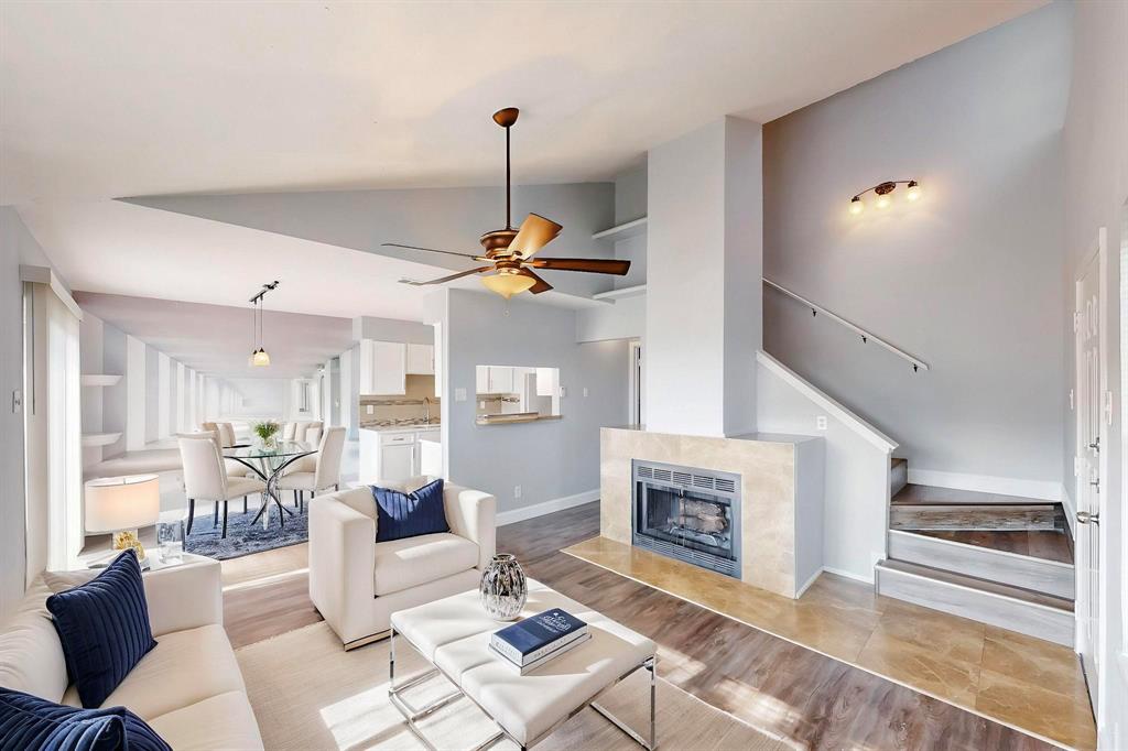 2240 Tarpley Road, Unit 464 Carrollton, TX 75006 - Photo 4 of 18 a living room with furniture and a fireplace