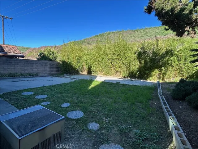 a view of an outdoor space and a yard