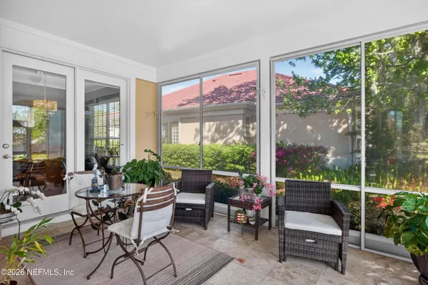 a outdoor living space with furniture and garden view