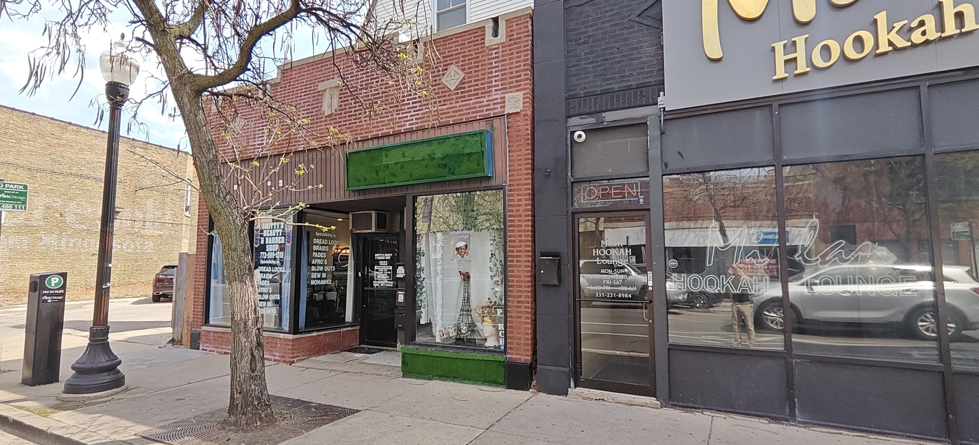 1523 West Devon Avenue Chicago, IL 60660 - Photo 2 of 5 a view of a building with sitting area