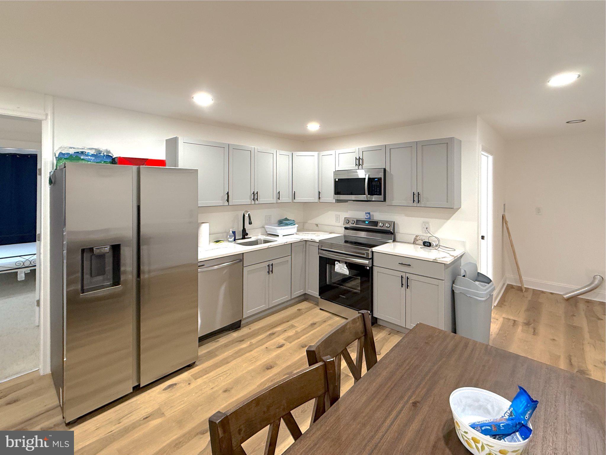 3703 6th Street, Unit 1 Baltimore, MD 21225 - Photo 8 of 12 Modern kitchen with sleek finishes.