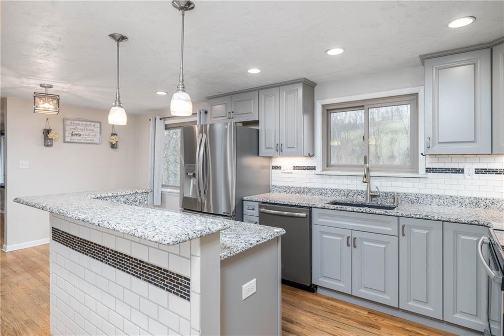137 Hornhead Road McDonald, PA 15057 - Photo 10 of 27 NEW RECESSED AND PENDANT LIGHTING IN THE KITCHEN