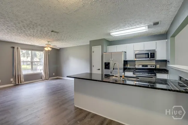 $1,975 | 402 Sterling Creek Drive, Richmond Hill, GA 31324