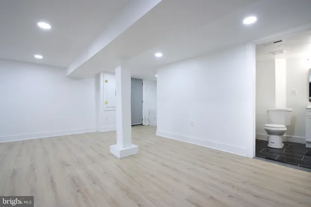 a view of entryway with wooden floor