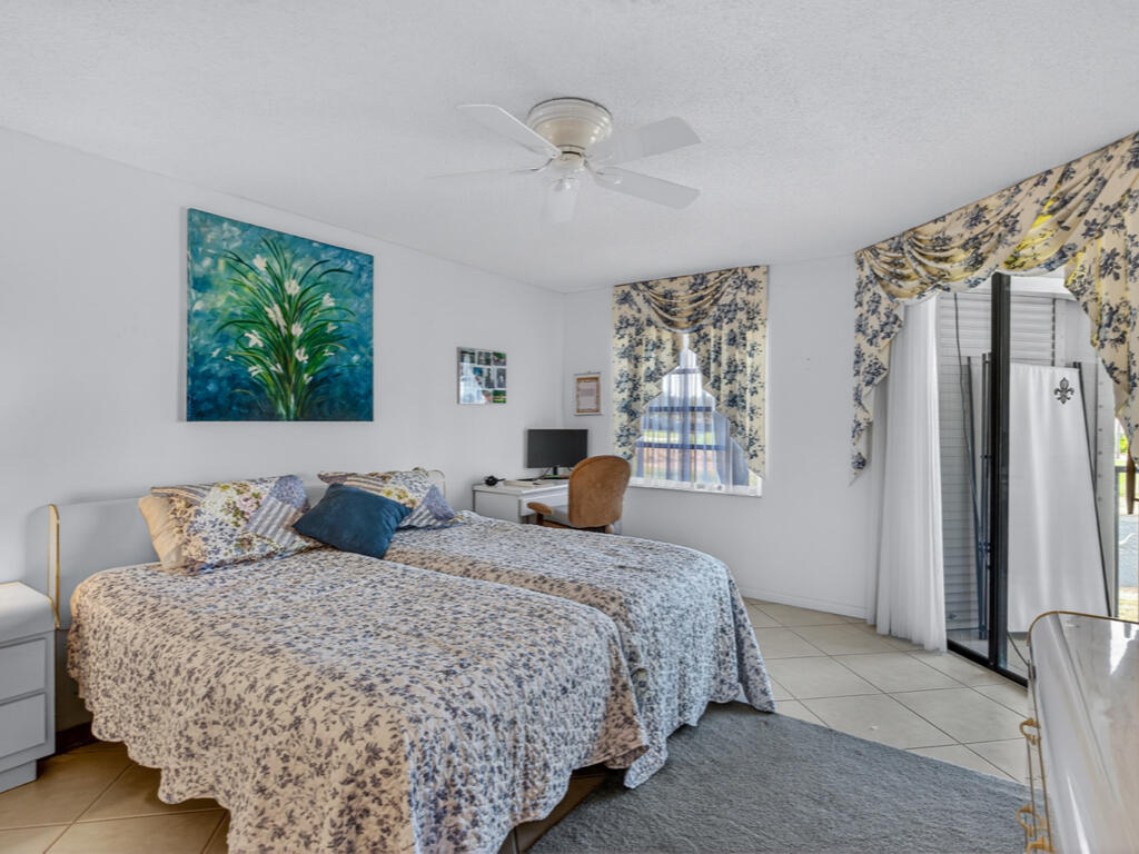 413 Augusta Boulevard, Unit 206 Naples, FL 34113 - Photo 10 of 14 413-augusta-blvd-206-naples-fl-34113-bed