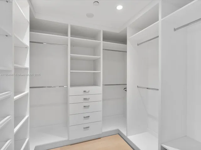 a view of a balcony with chair and tables