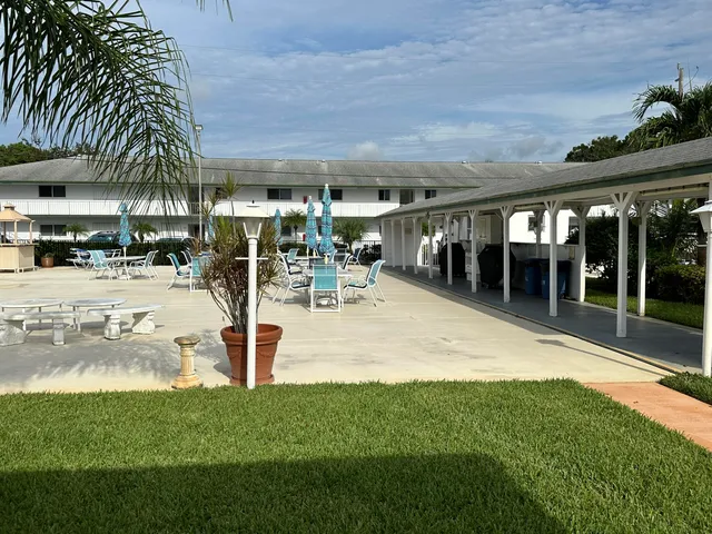 a view of swimming pool from a yard