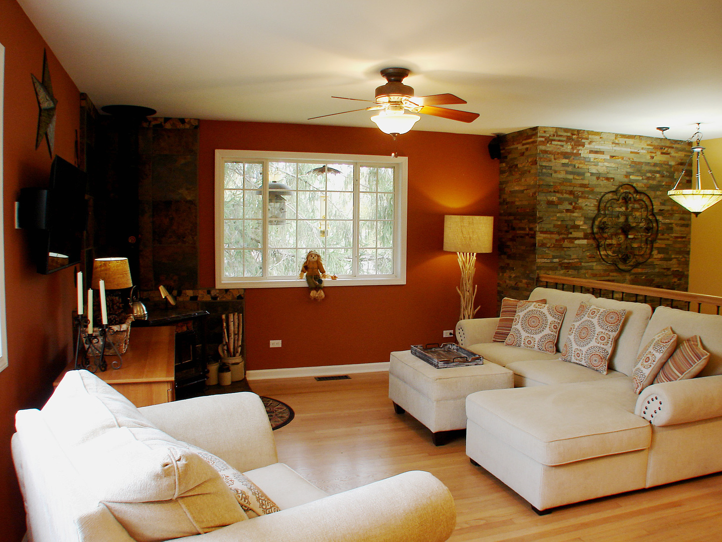 22 Manor Road Lake Zurich, IL 60047 - Photo 4 of 40 a living room with furniture and a large mirror next to a window