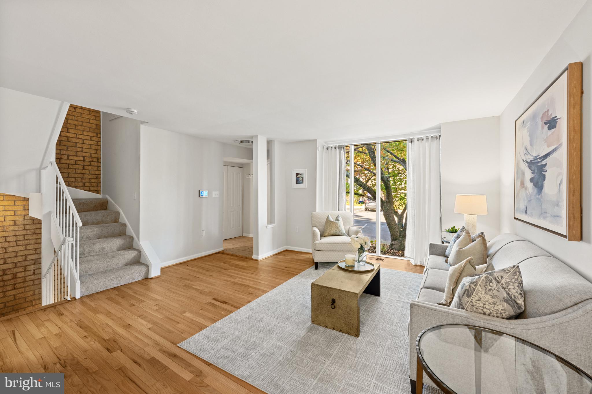 8044 Inverness Ridge Road Potomac, MD 20854 - Photo 3 of 29 a living room with furniture window and wooden floor