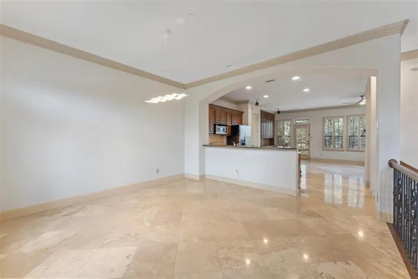 a view of kitchen and wooden floor