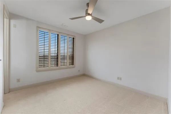 an empty room with a bathroom