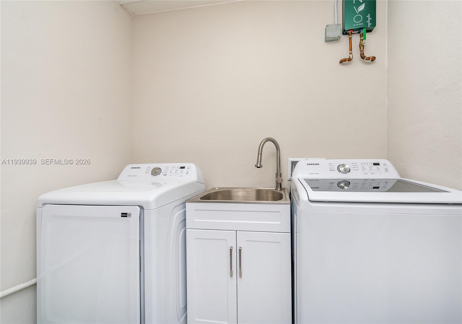 12851 Luray Road Southwest Ranches, FL 33330 - Photo 28 of 43 a utility room with dryer and washer