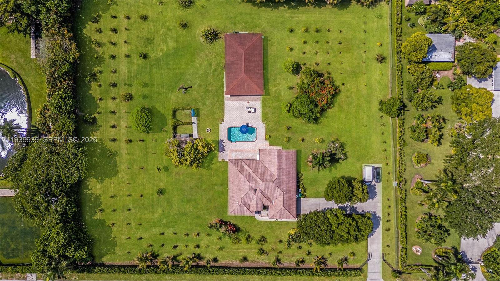 12851 Luray Road Southwest Ranches, FL 33330 - Photo 29 of 43 an aerial view of a house with a yard