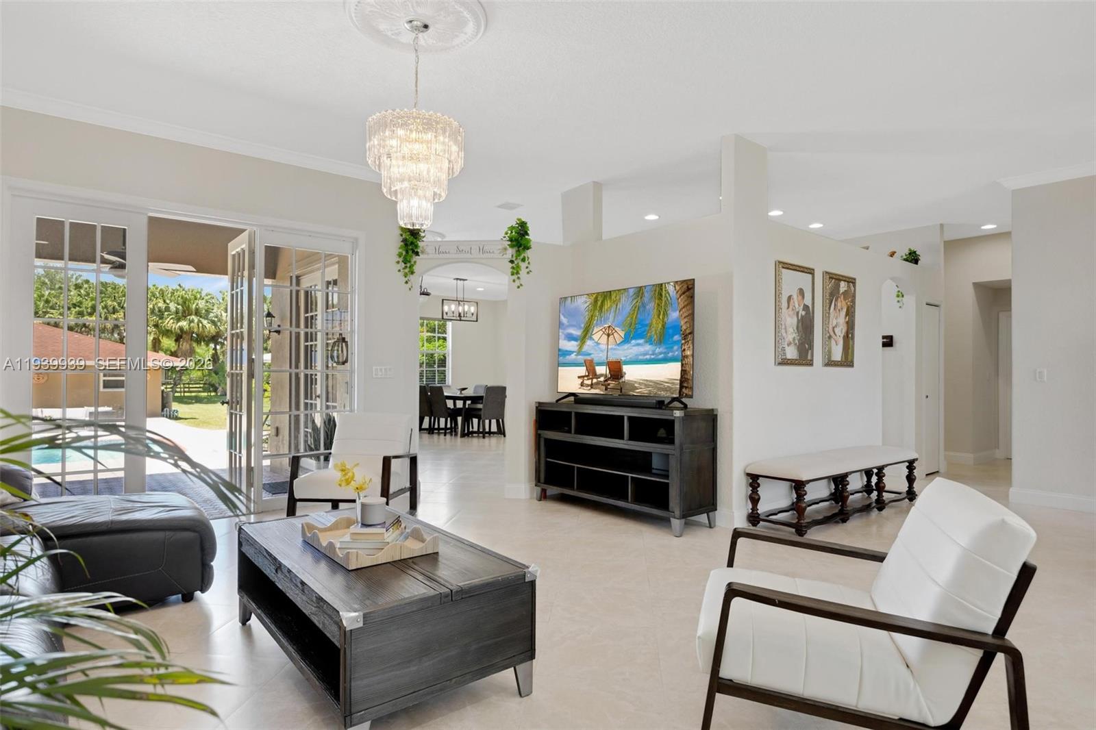 12851 Luray Road Southwest Ranches, FL 33330 - Photo 3 of 43 a living room with furniture and a table