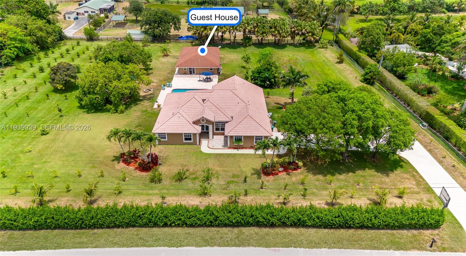 12851 Luray Road Southwest Ranches, FL 33330 - Photo 40 of 43 an aerial view of house with yard swimming pool and outdoor seating