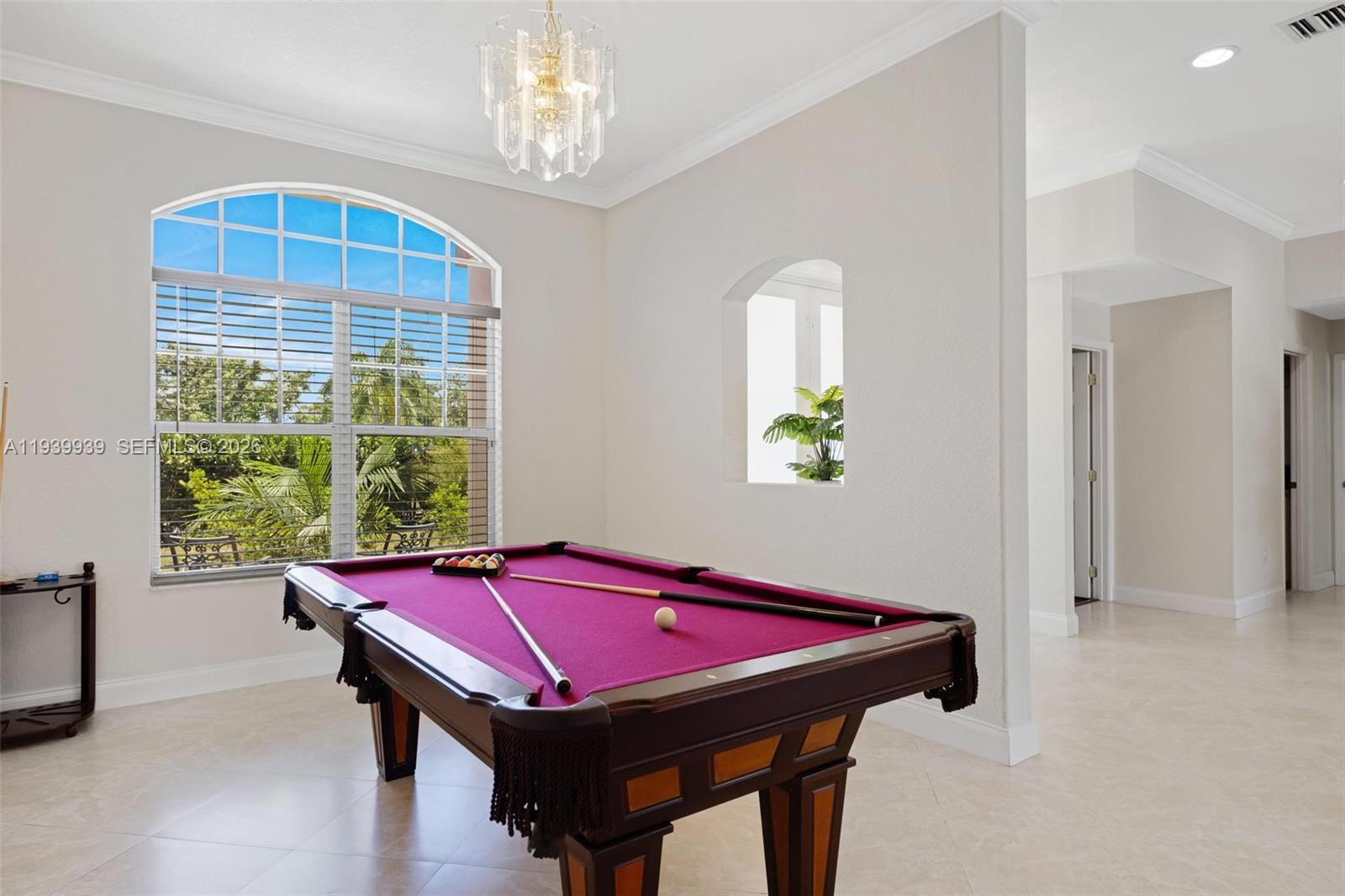 12851 Luray Road Southwest Ranches, FL 33330 - Photo 4 of 43 a room with pool table windows and chandelier