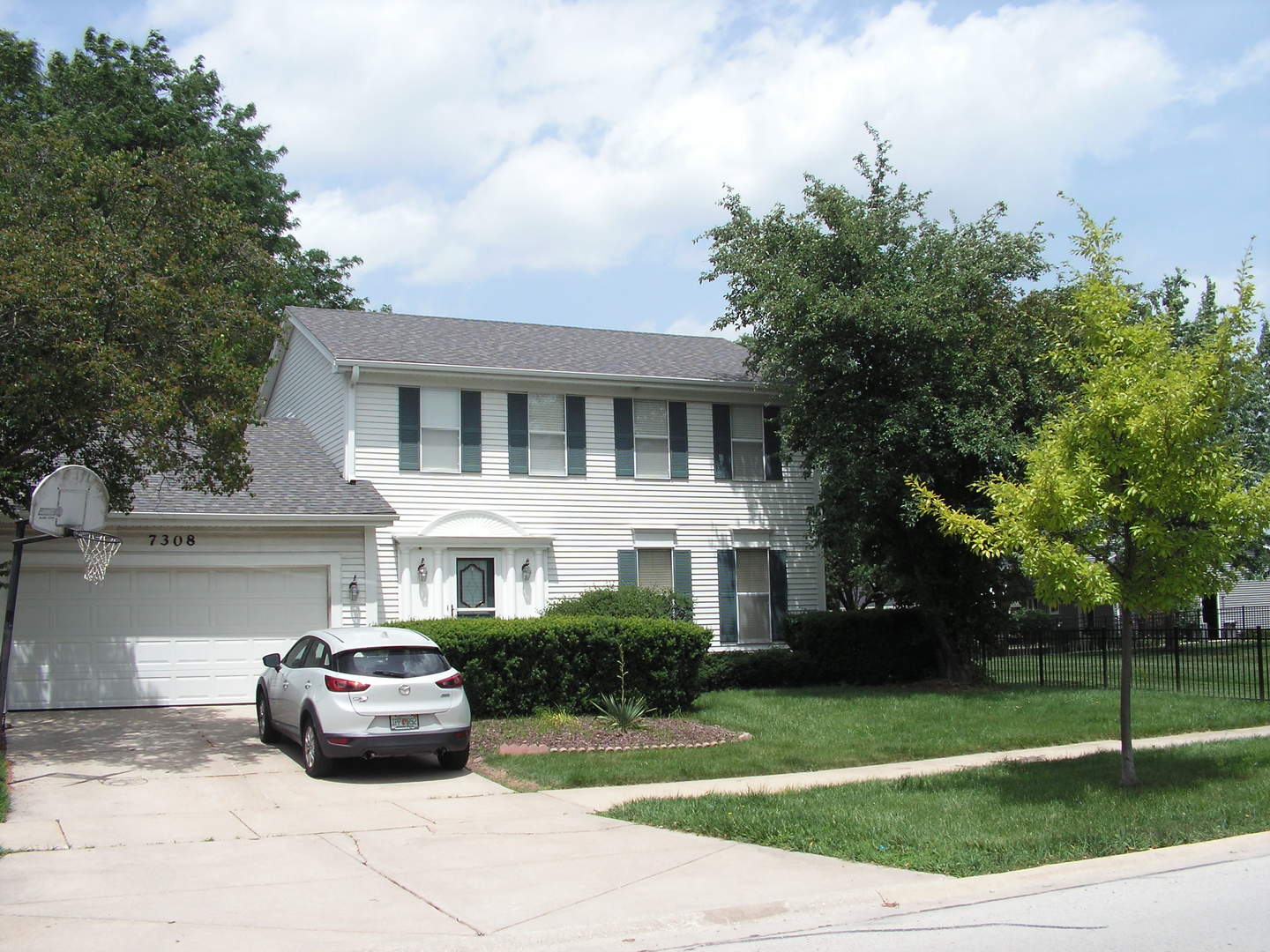 7308 Devereux Road Downers Grove, IL 60516 - Photo 1 of 34 a view of house with outdoor space and swimming pool
