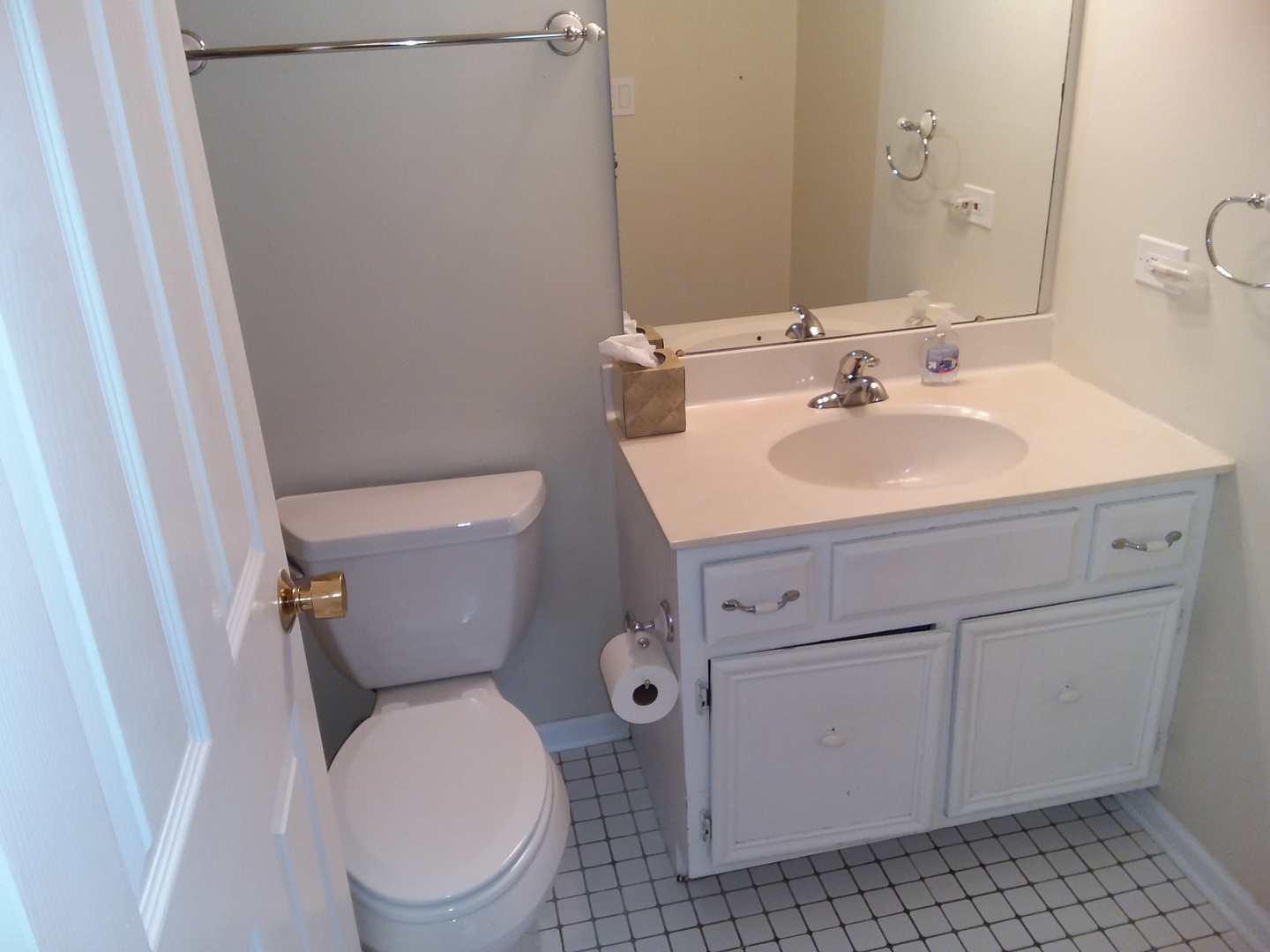 7308 Devereux Road Downers Grove, IL 60516 - Photo 32 of 34 a white toilet sitting next to a bathroom sink