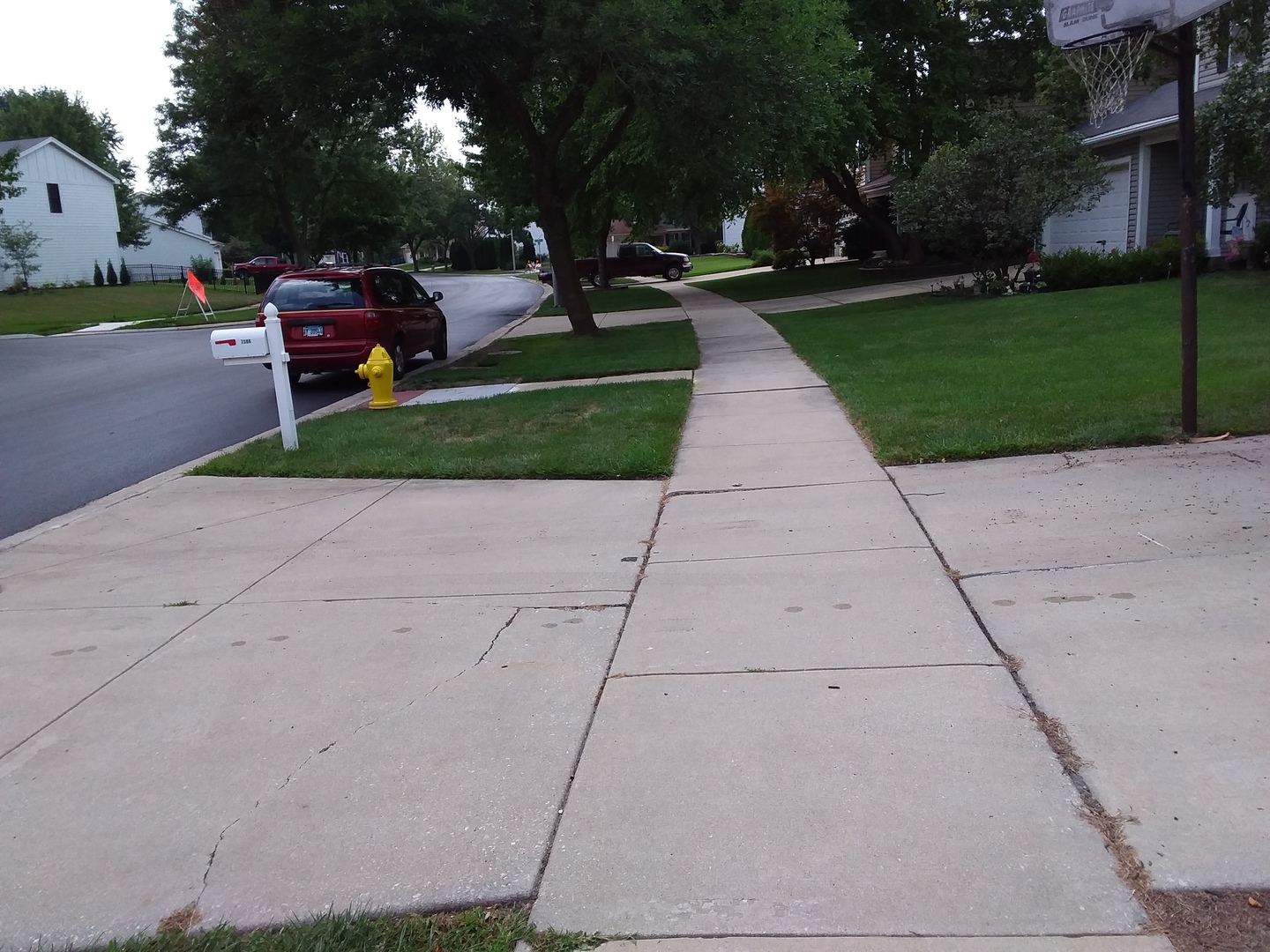7308 Devereux Road Downers Grove, IL 60516 - Photo 5 of 34 a view of street with parked cars