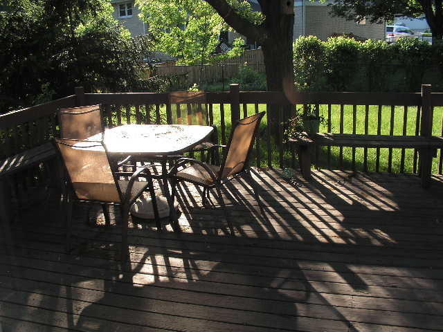 7308 Devereux Road Downers Grove, IL 60516 - Photo 6 of 34 a view of a chairs and table on the wooden floor