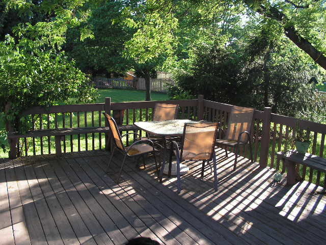7308 Devereux Road Downers Grove, IL 60516 - Photo 7 of 34 a view of a balcony with wooden floor