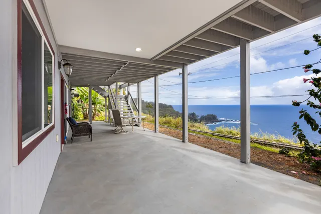 a view of an empty room with a large window