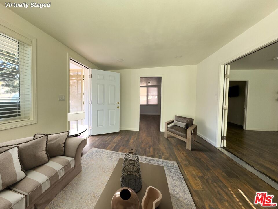 2947 Los Robles Road Thousand Oaks, CA 91362 - Photo 11 of 31 a living room with furniture and a wooden floor