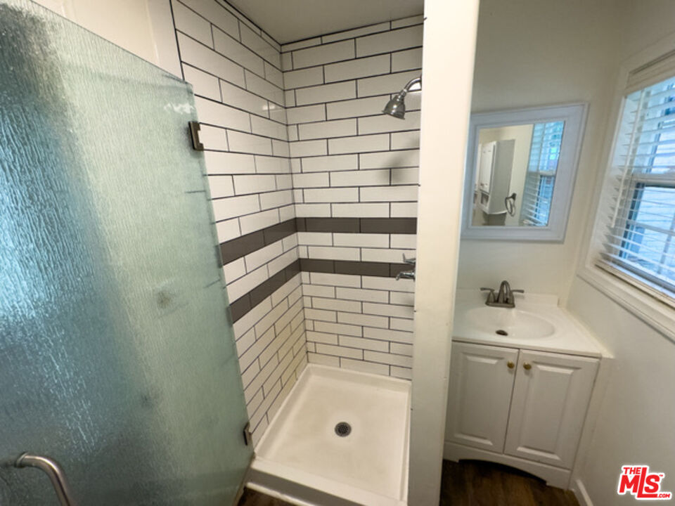 2947 Los Robles Road Thousand Oaks, CA 91362 - Photo 19 of 31 a bathroom with a shower toilet and sink