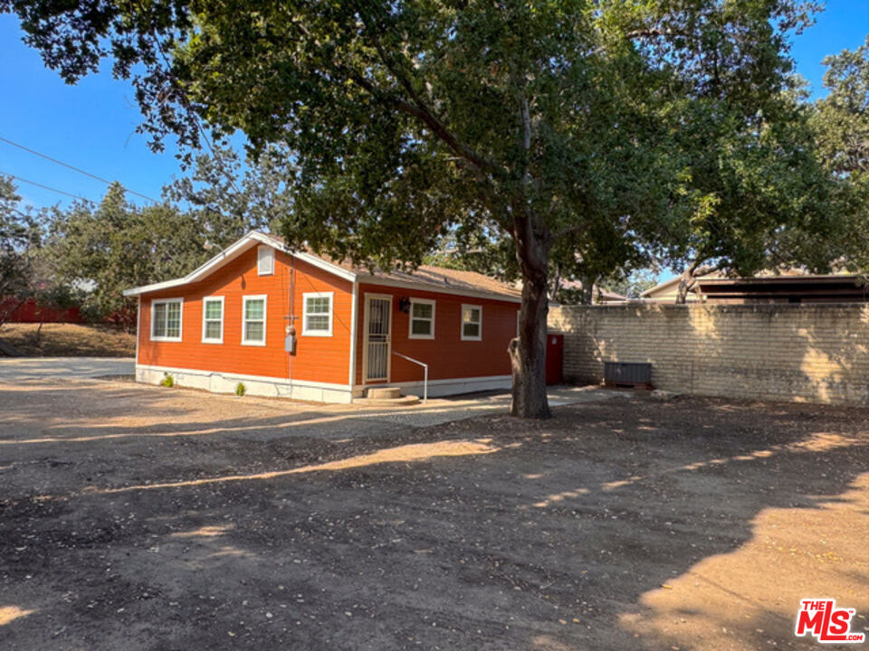 2947 Los Robles Road Thousand Oaks, CA 91362 - Photo 22 of 31 a front view of a house with a yard