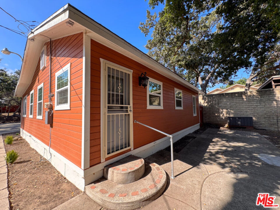 2947 Los Robles Road Thousand Oaks, CA 91362 - Photo 27 of 31 a backyard of a house with wooden floor chairs and barbeque oven