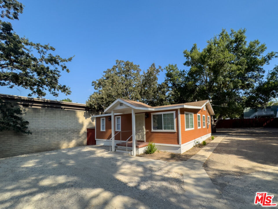 2947 Los Robles Road Thousand Oaks, CA 91362 - Photo 6 of 31 a view of a house with a backyard