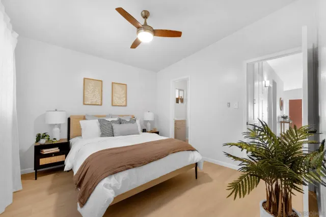 a bathroom with a sink toilet and mirror