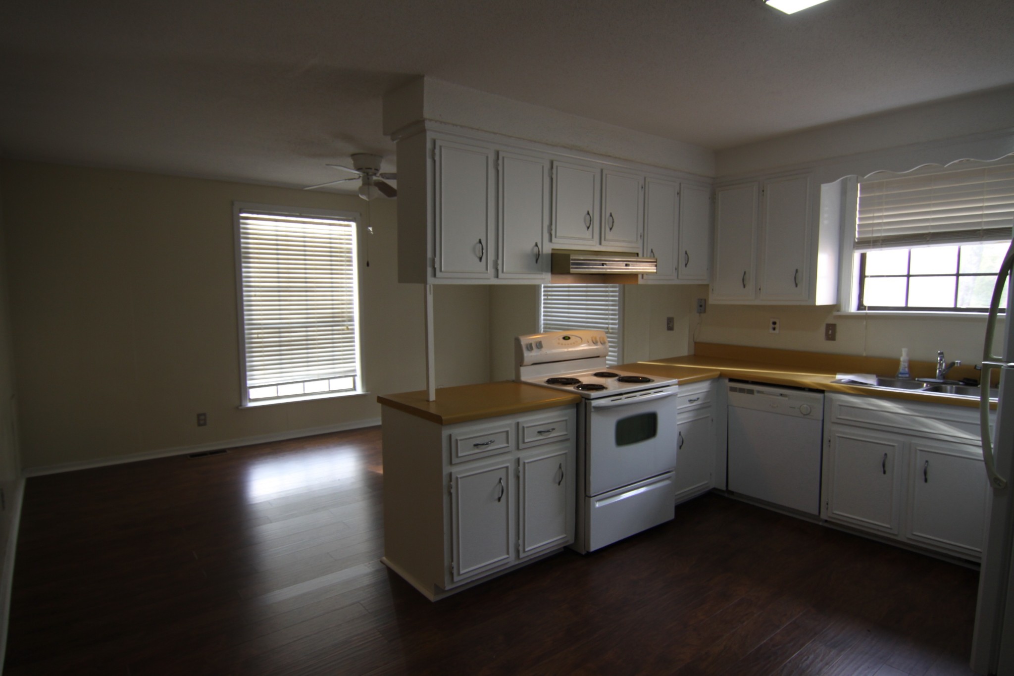337 Rossview Road Clarksville, TN 37043 - Photo 7 of 22 a kitchen with stainless steel appliances a sink a stove a refrigerator and cabinets
