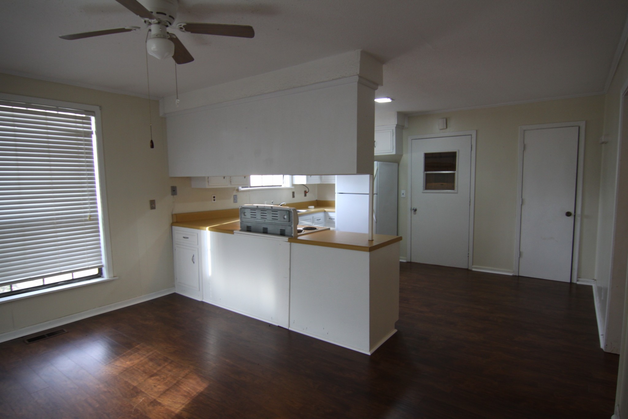 337 Rossview Road Clarksville, TN 37043 - Photo 10 of 22 a kitchen with a refrigerator and a stove top oven