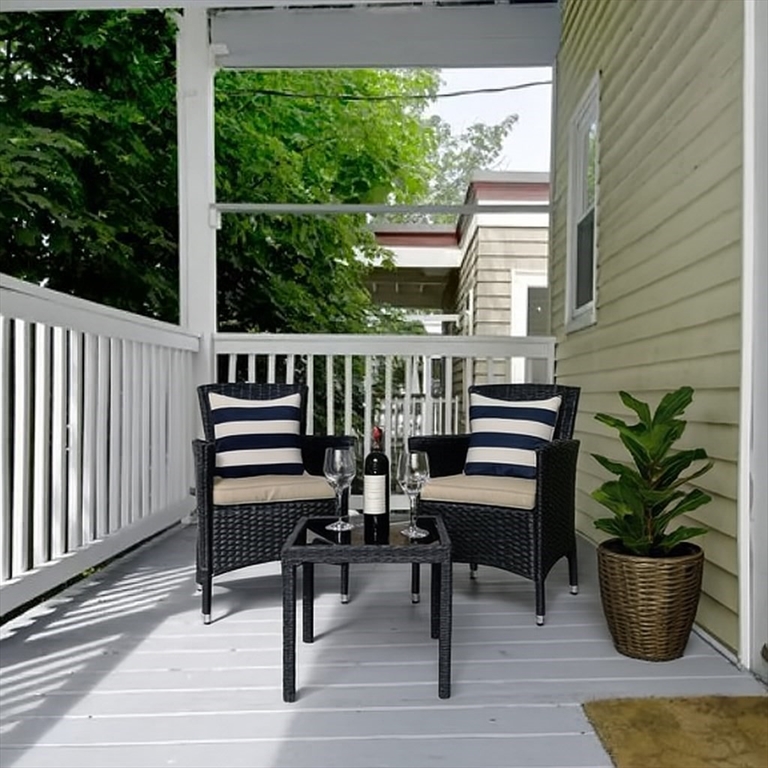 18 Chase Street, Unit 1 Boston, MA 02125 - Photo 10 of 10 a view of a bench in back yard of a house