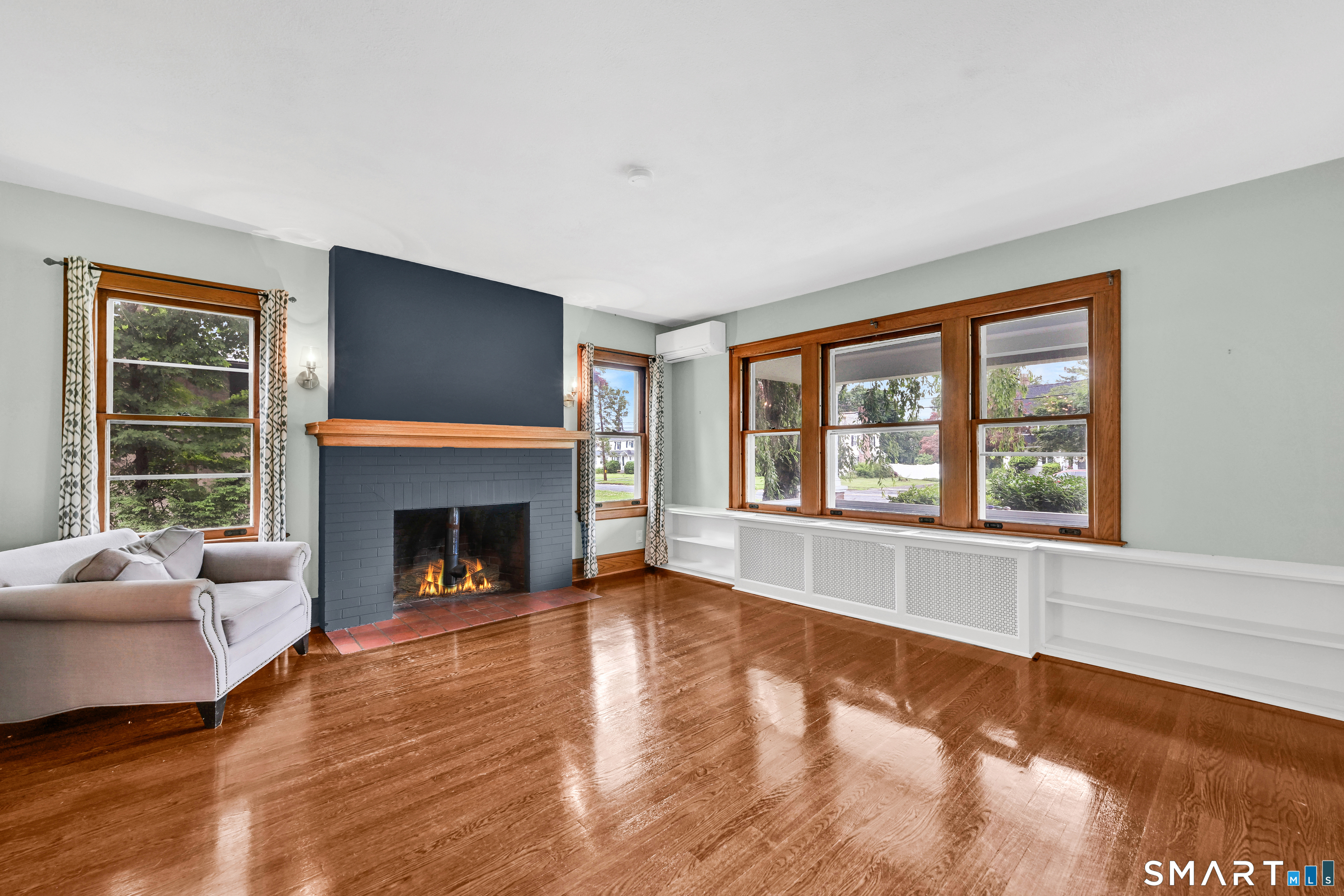 295 Wolcott Hill Road Wethersfield, CT 06109 - Photo 6 of 40 Beautiful windows look out to the wrap around front porch