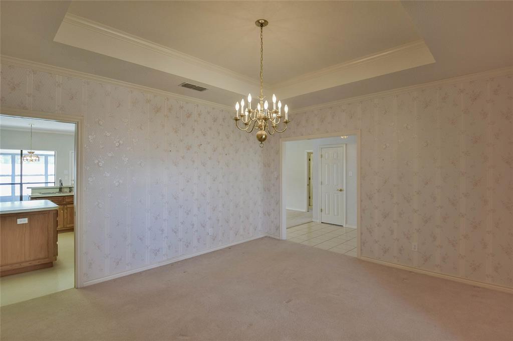 9110 Ravenswood Road Granbury, TX 76049 - Photo 18 of 40 formal Dining area off the kitchen and foyer