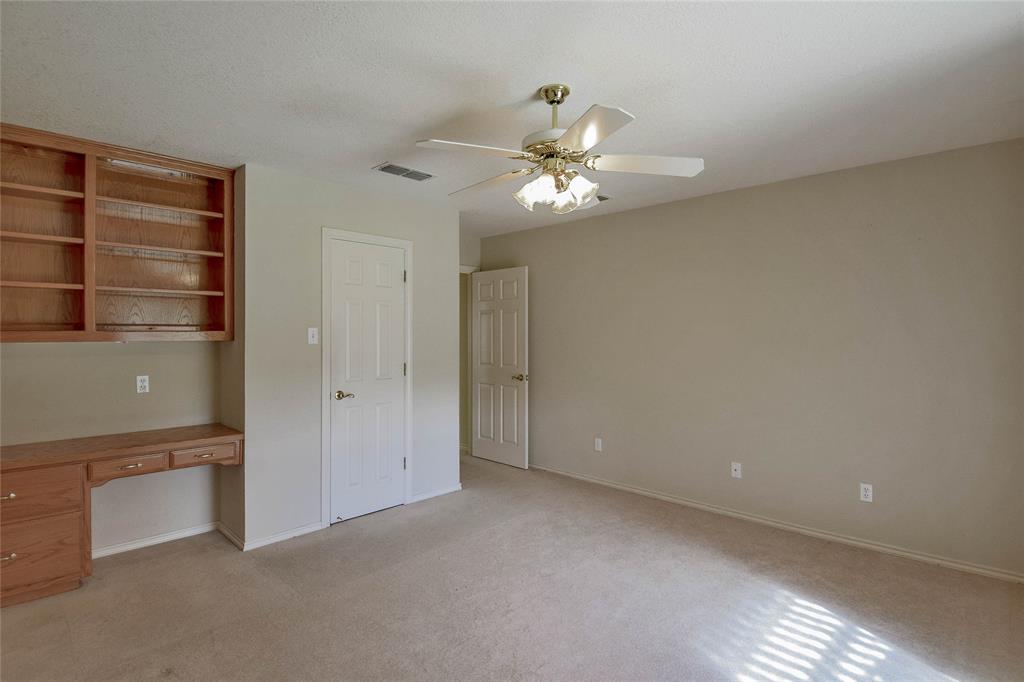 9110 Ravenswood Road Granbury, TX 76049 - Photo 29 of 40 Bedroom with built-in desk