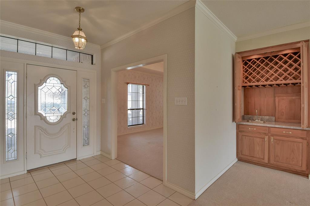 9110 Ravenswood Road Granbury, TX 76049 - Photo 8 of 40 Just off the entry is the formal dining room