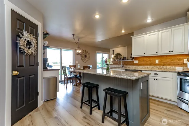 a bedroom with a bed and a television