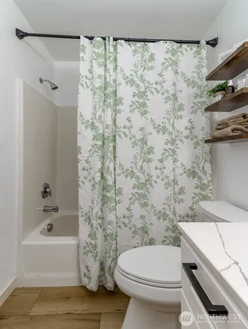 a view of swimming pool with outdoor seating and yard in back