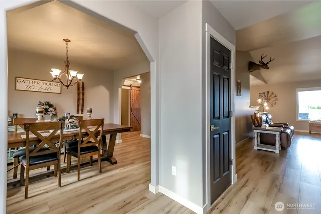 a living room with furniture fireplace and flat screen tv