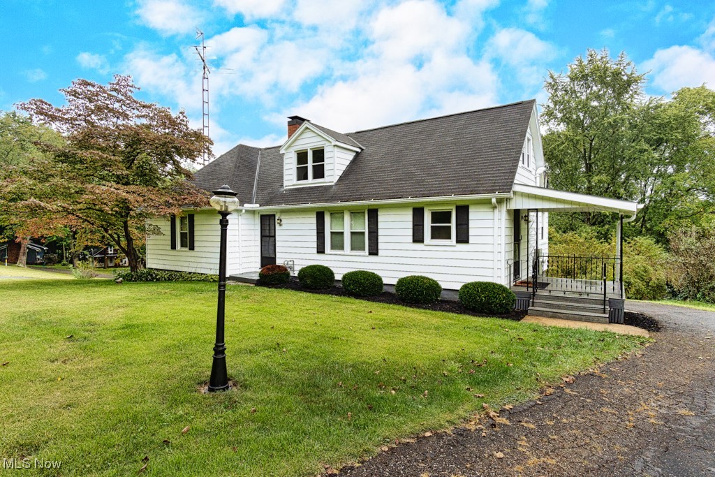 1290 Ridge Road Salem, OH 44460 - Photo 2 of 50 Great side porch to enjoy