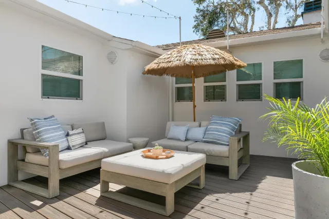 a view of a swimming pool with sitting area