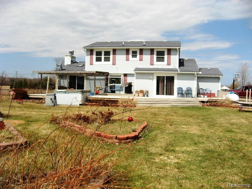 9053 Weber Road Columbus, MI 48063 - Photo 2 of 34 Back of house.jpg