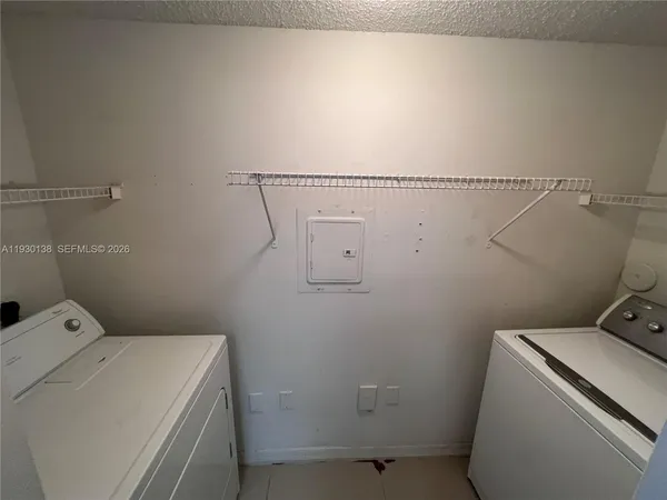 $2,400 | 5061 Wiles Road, Unit 102, Coconut Creek, FL 33073