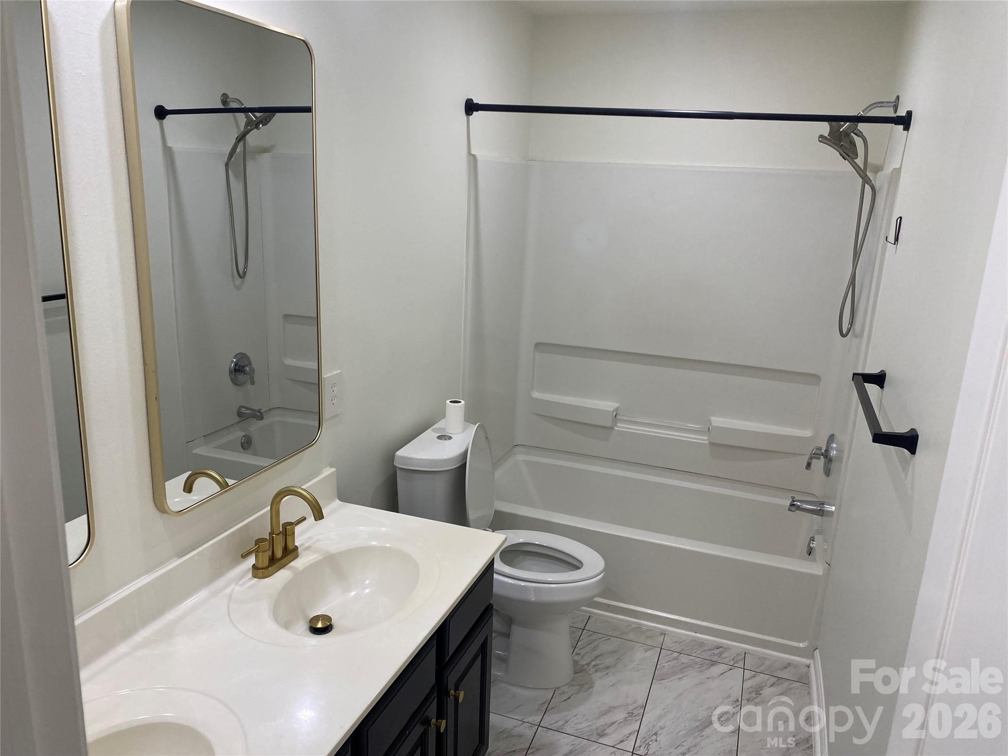 2054 Durand Road Fort Mill, SC 29715 - Photo 16 of 29 a bathroom with a sink toilet and shower