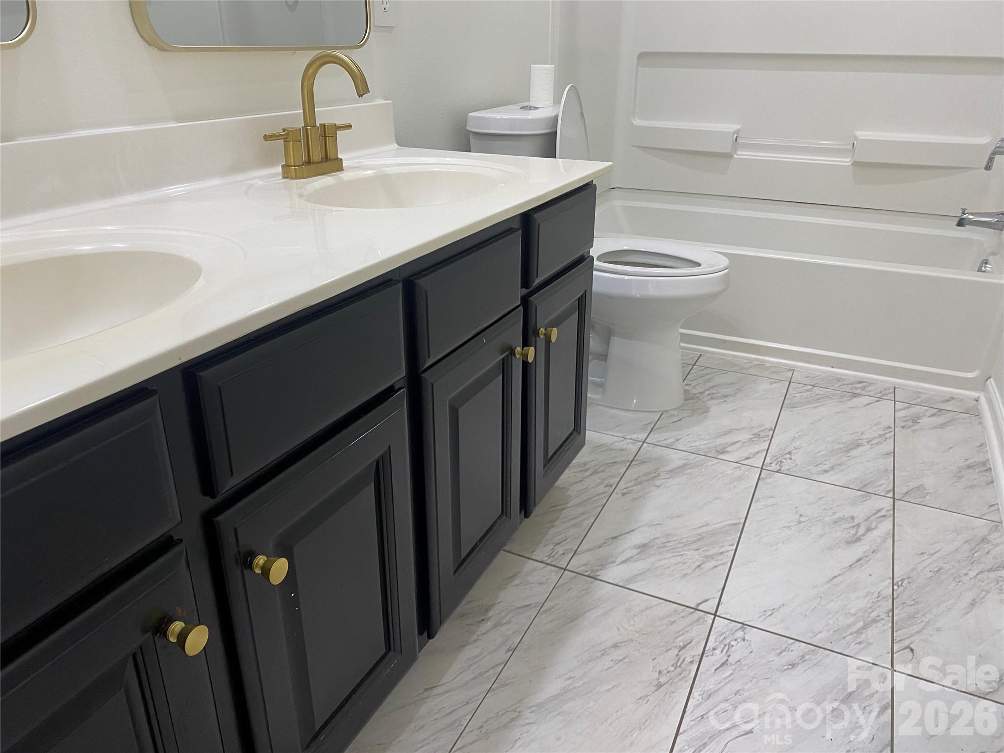 2054 Durand Road Fort Mill, SC 29715 - Photo 16 of 30 a bathroom with a sink and a toilet