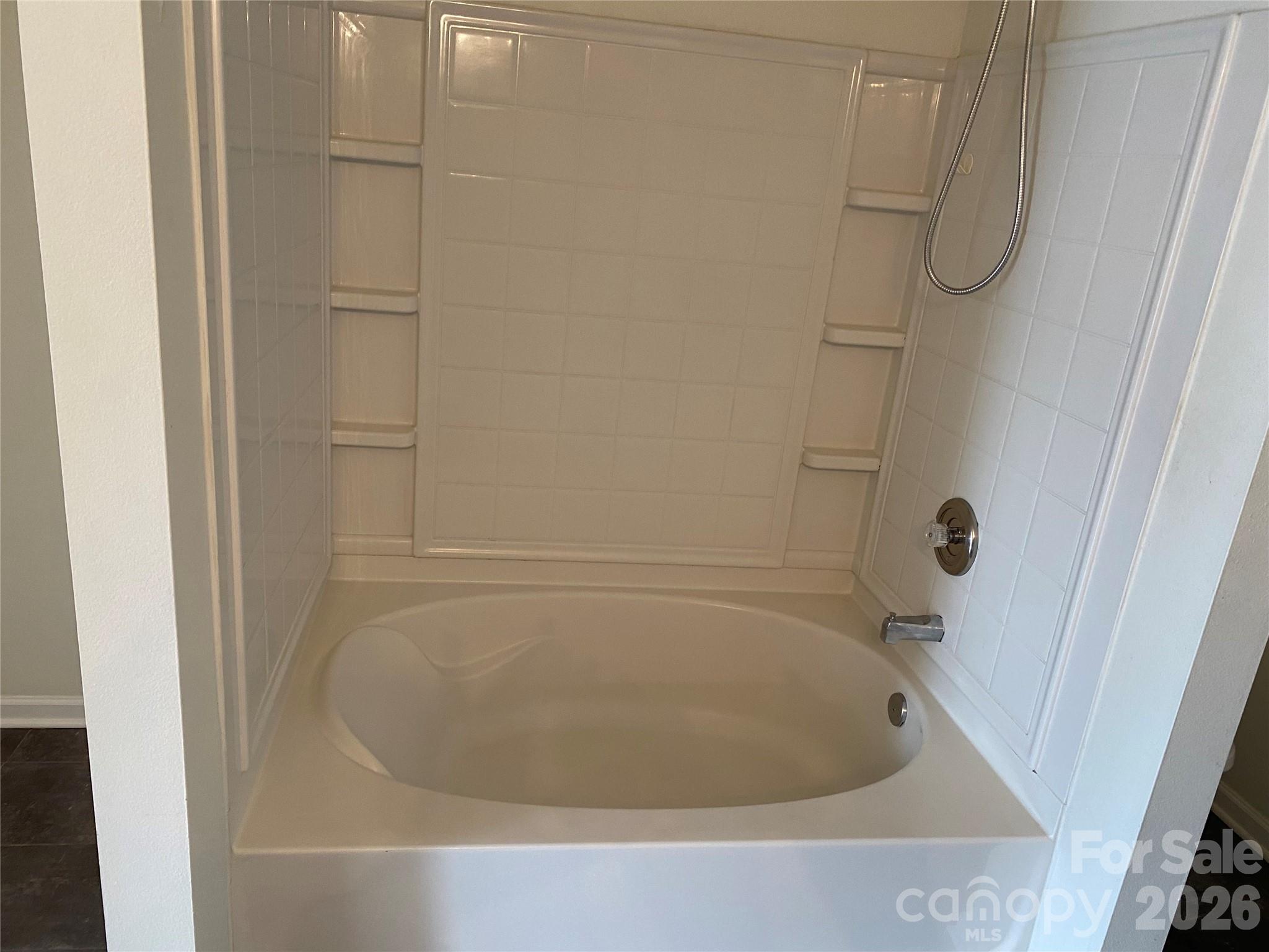 2054 Durand Road Fort Mill, SC 29715 - Photo 17 of 29 a bathroom with a bathtub